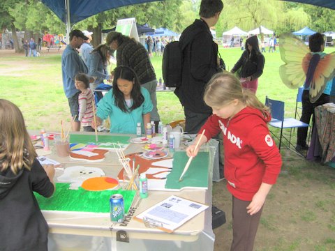Volunteers have fun painting signs at Springfest 2010